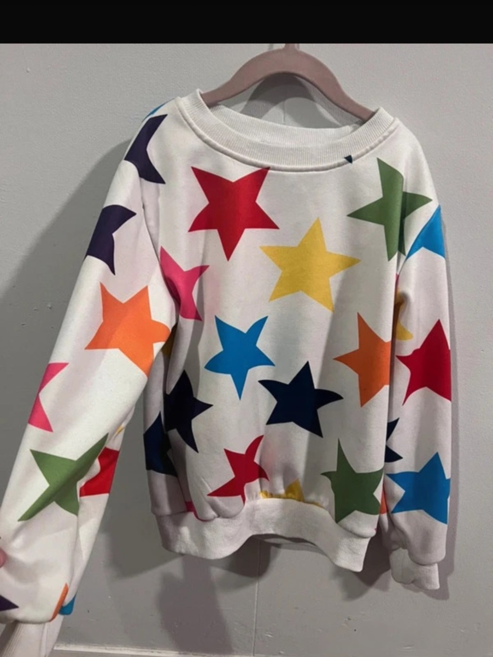 Lola + The Boys White Crewneck Sweatshirt with multi colored stars